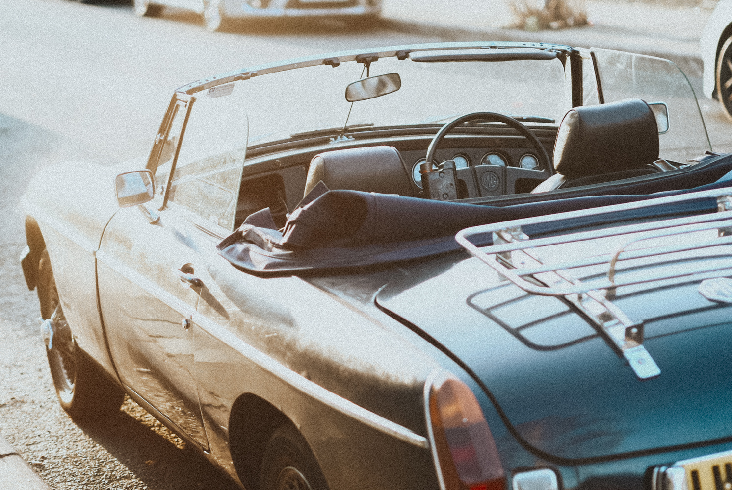 Why and time, self-assignments , photograph of convertible car in sunlight