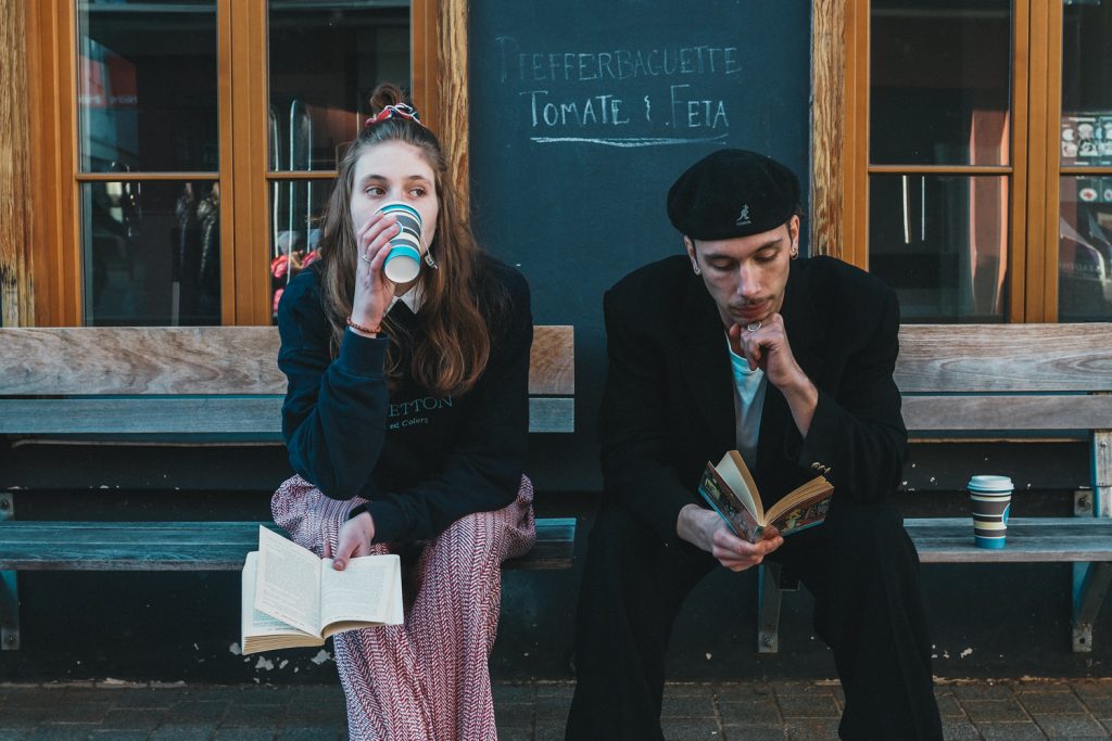 Fashion Storytelling photo woman drinking coffee and man reading