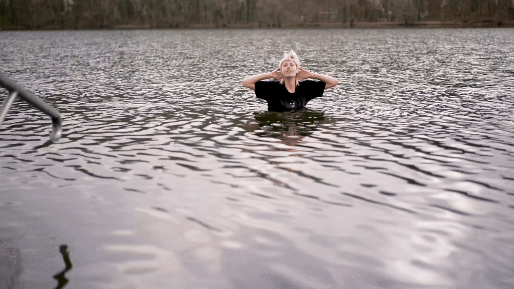 film clip video of a girl icebathing