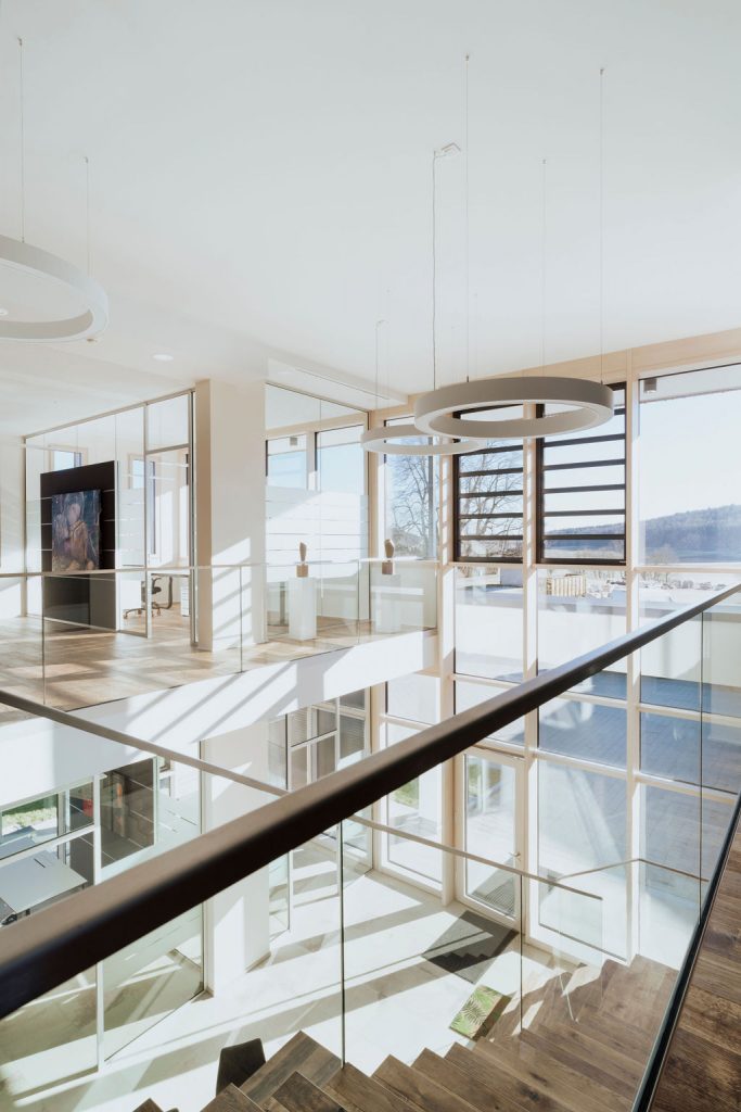 Interior Photography of a building with sun coming through large glass windows