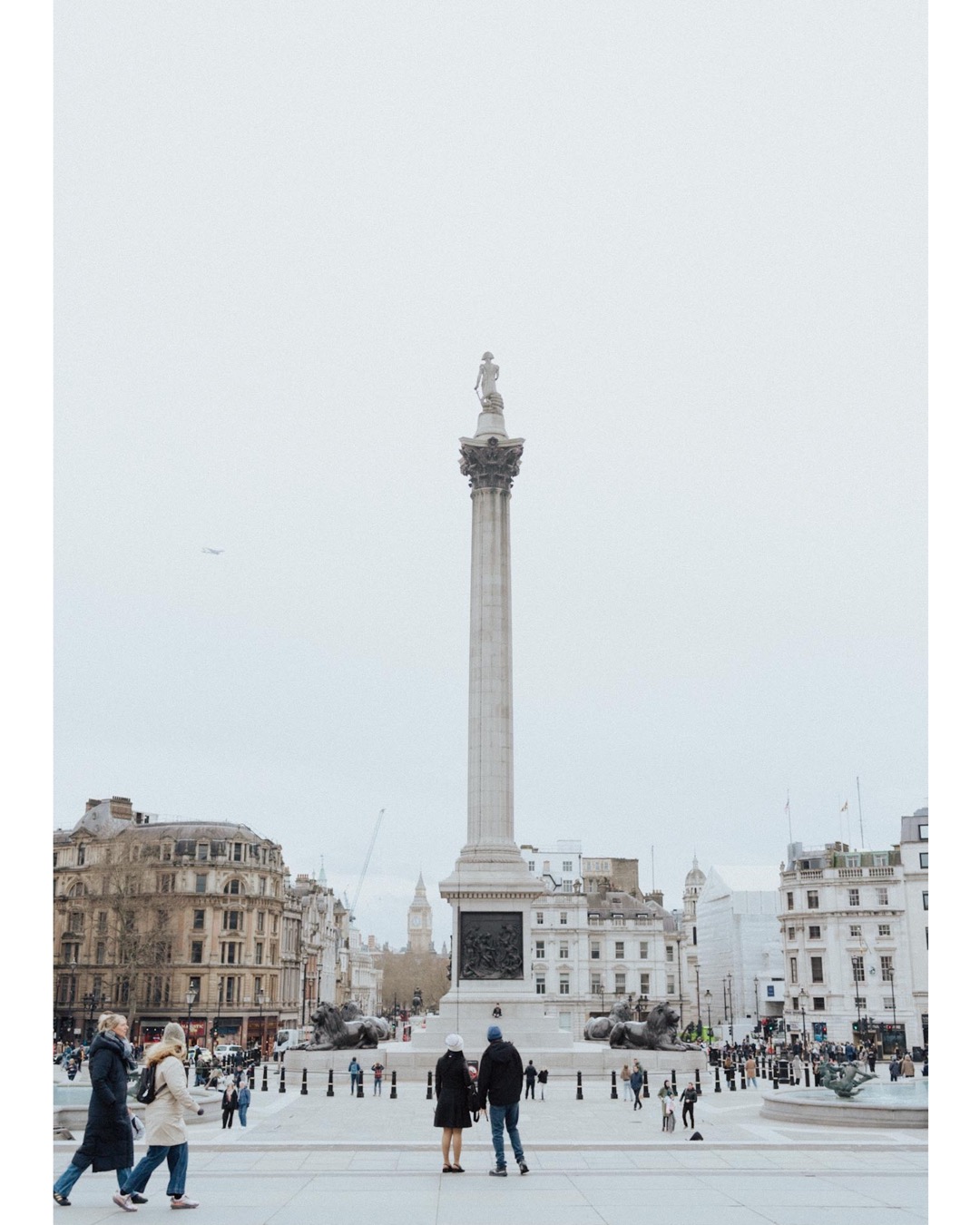 photo of everyday stories: a couple looking over the London Trafalgar Square