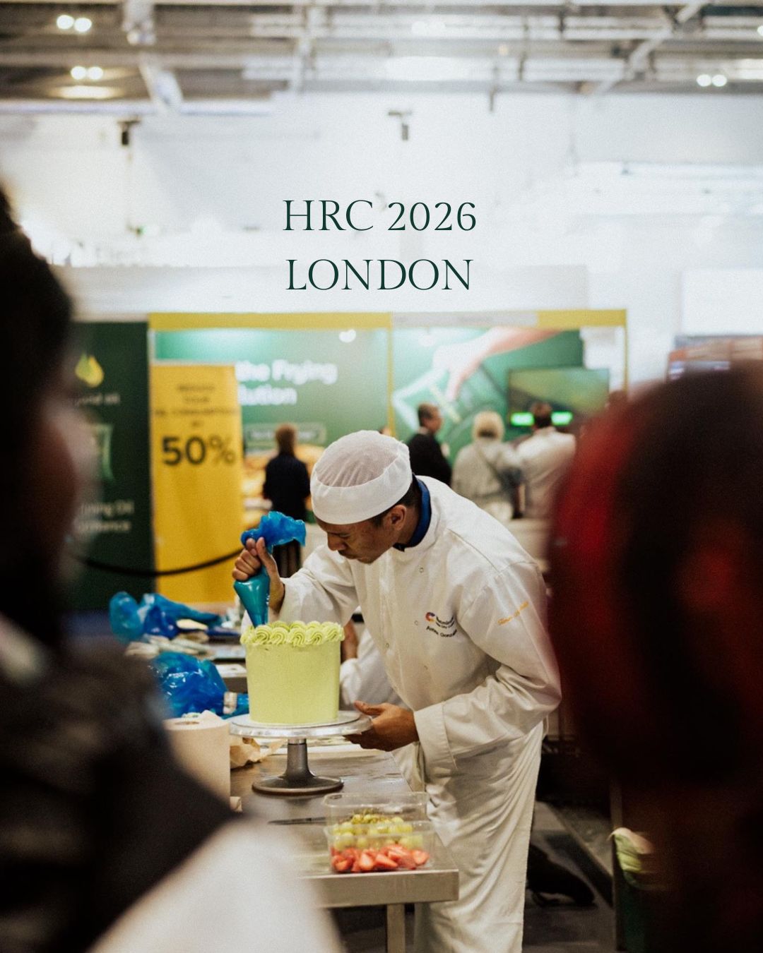 Young Man decorating a cake at the Hospitality Week at the Excel London