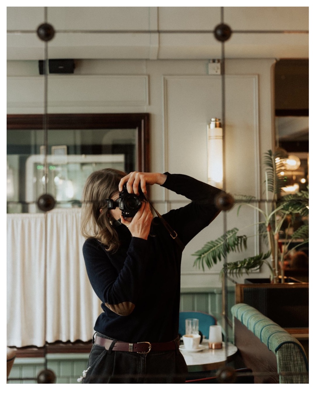 Storytelling Brand Photographer Nadine Wilmanns in a coffee shop in London