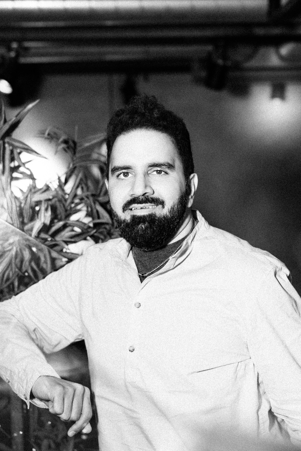 Black and White Portrait of SEO Expert Dillan Gandhi of Searchlight London