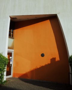 orange door near Hammersmith Riverside London as photo backdrop