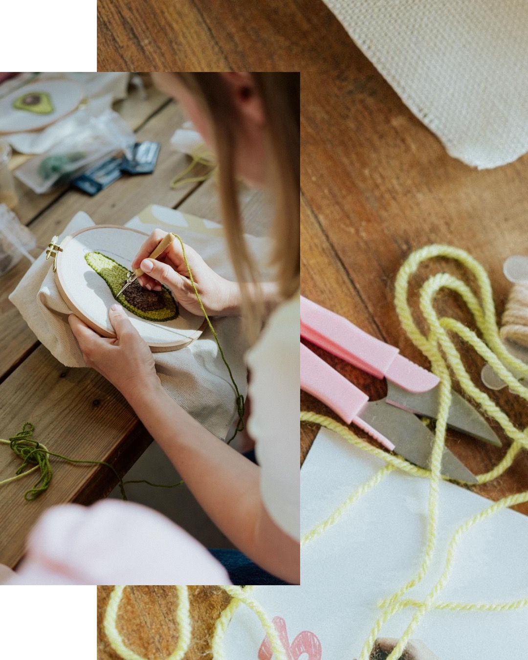 Close-up shot of hands guiding thick pink yarn through fabric using a punch needle tool during a craft workshop.